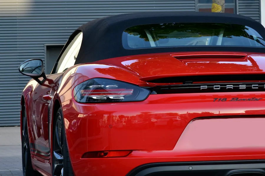 Mirror-finish car detailing on a navy blue SUV hood in Maylands, Perth.